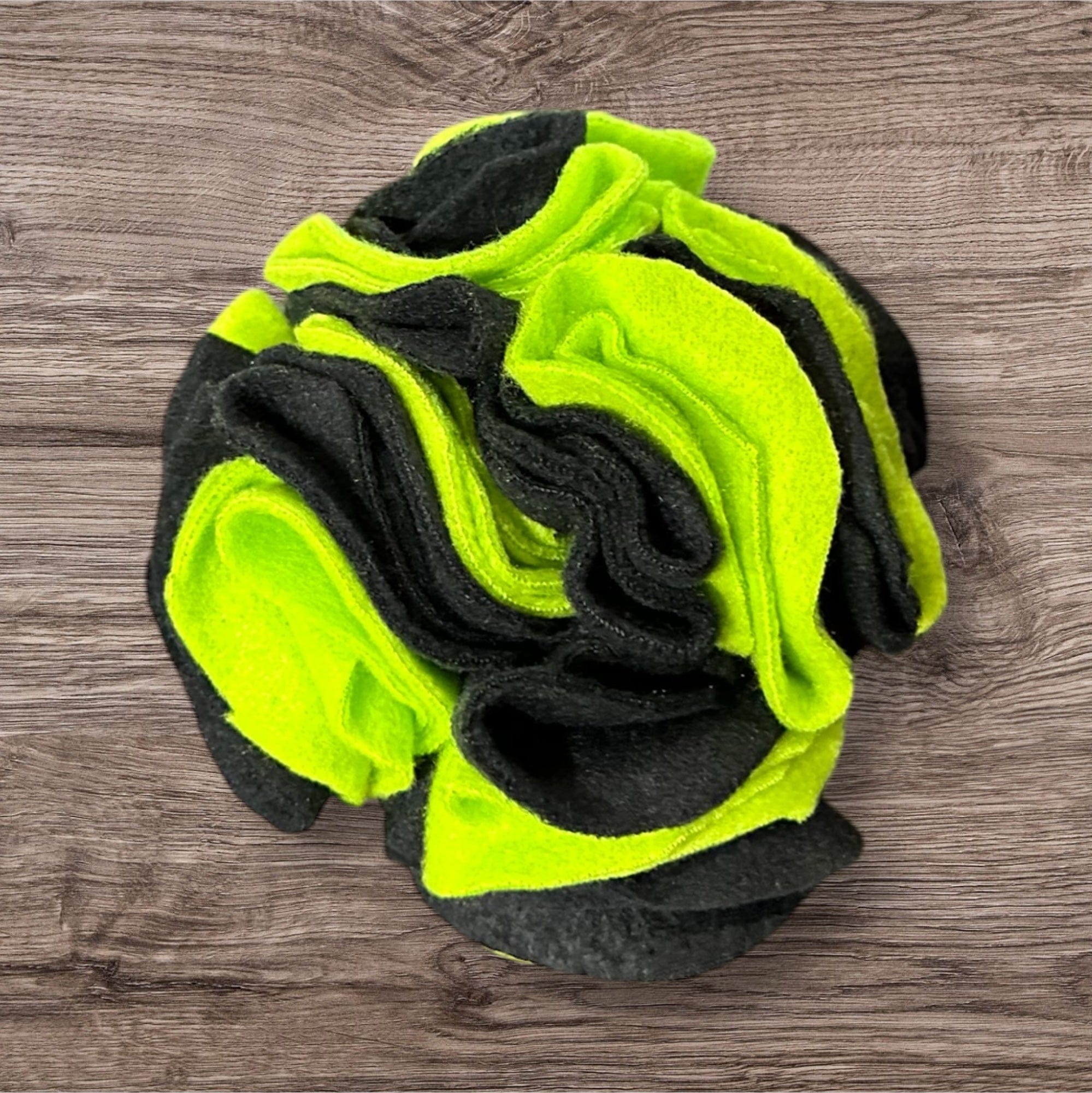 Buffalo Freeze Dry small snuffle ball for dogs, featuring colorful fabric and textured surfaces for interactive play.