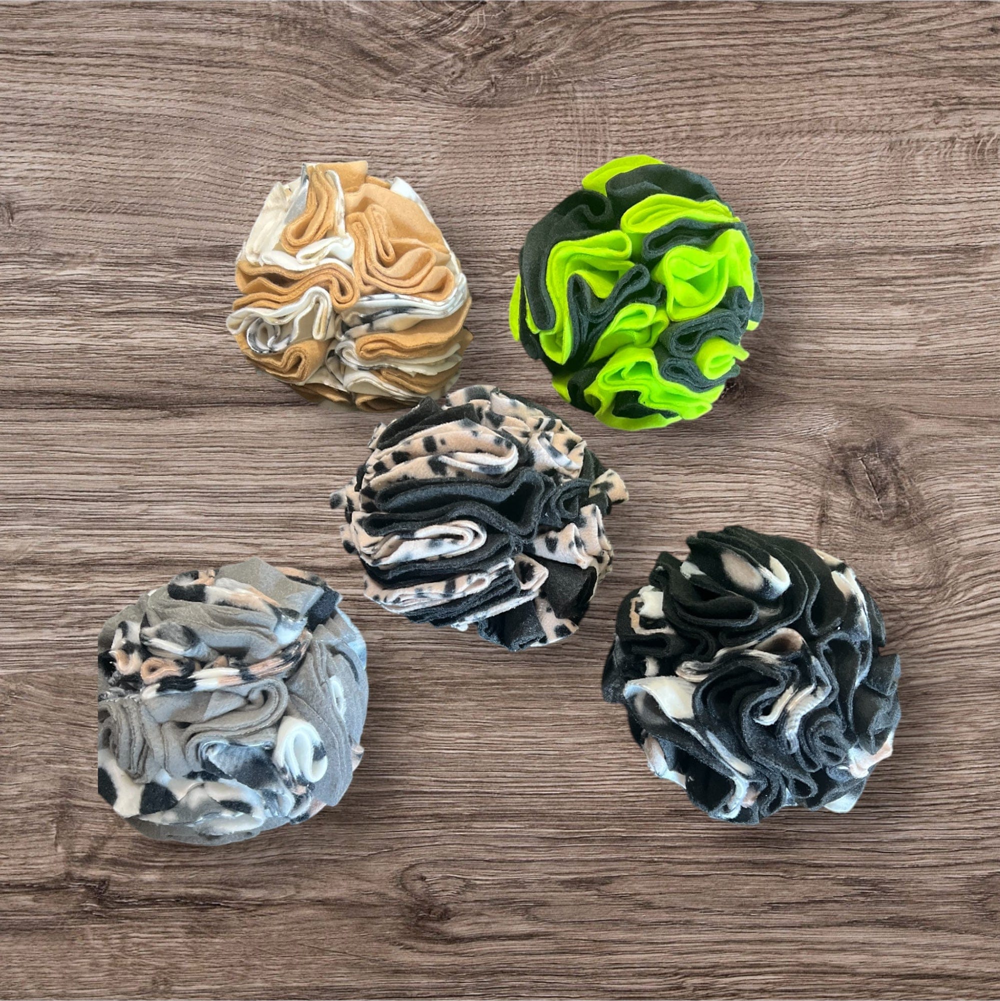 Buffalo Freeze Dry large snuffle ball for dogs, featuring colorful fabric and hidden treat compartments for interactive play.