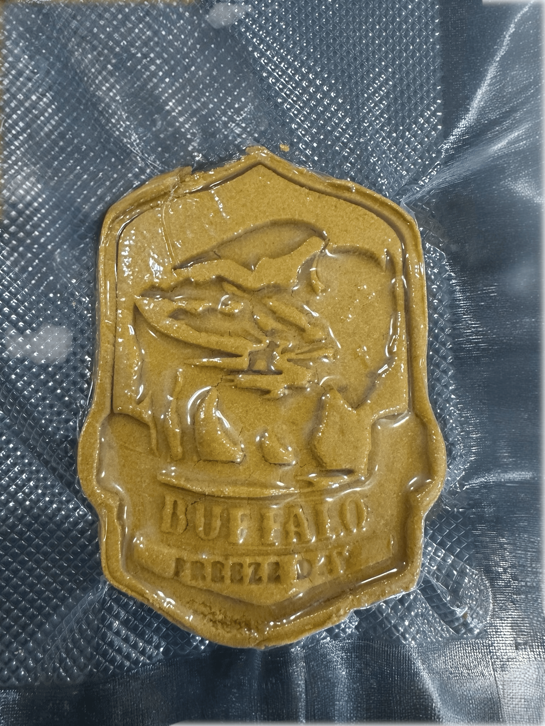 Buffalo Freeze Dry Buffalo Barkery Cookies in a packaging, showcasing the unique, crunchy dog treats inside.