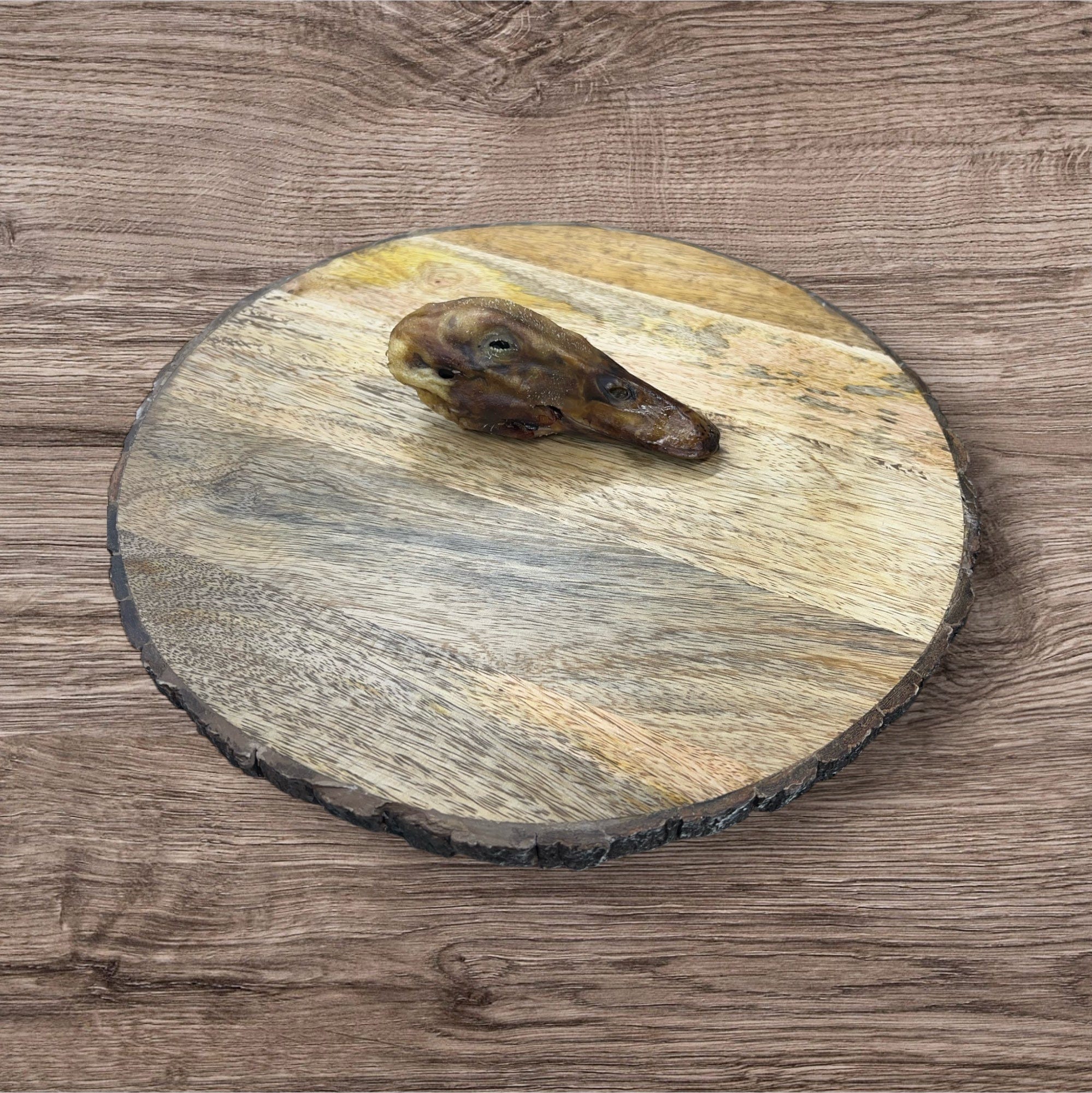 Dehydrated duck head from Buffalo Freeze Dry, showcasing a whole duck head with natural texture and color.