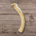 Buffalo Freeze Dry Whitetail Deer Antler Chews, medium size, featuring natural texture and rich brown color.