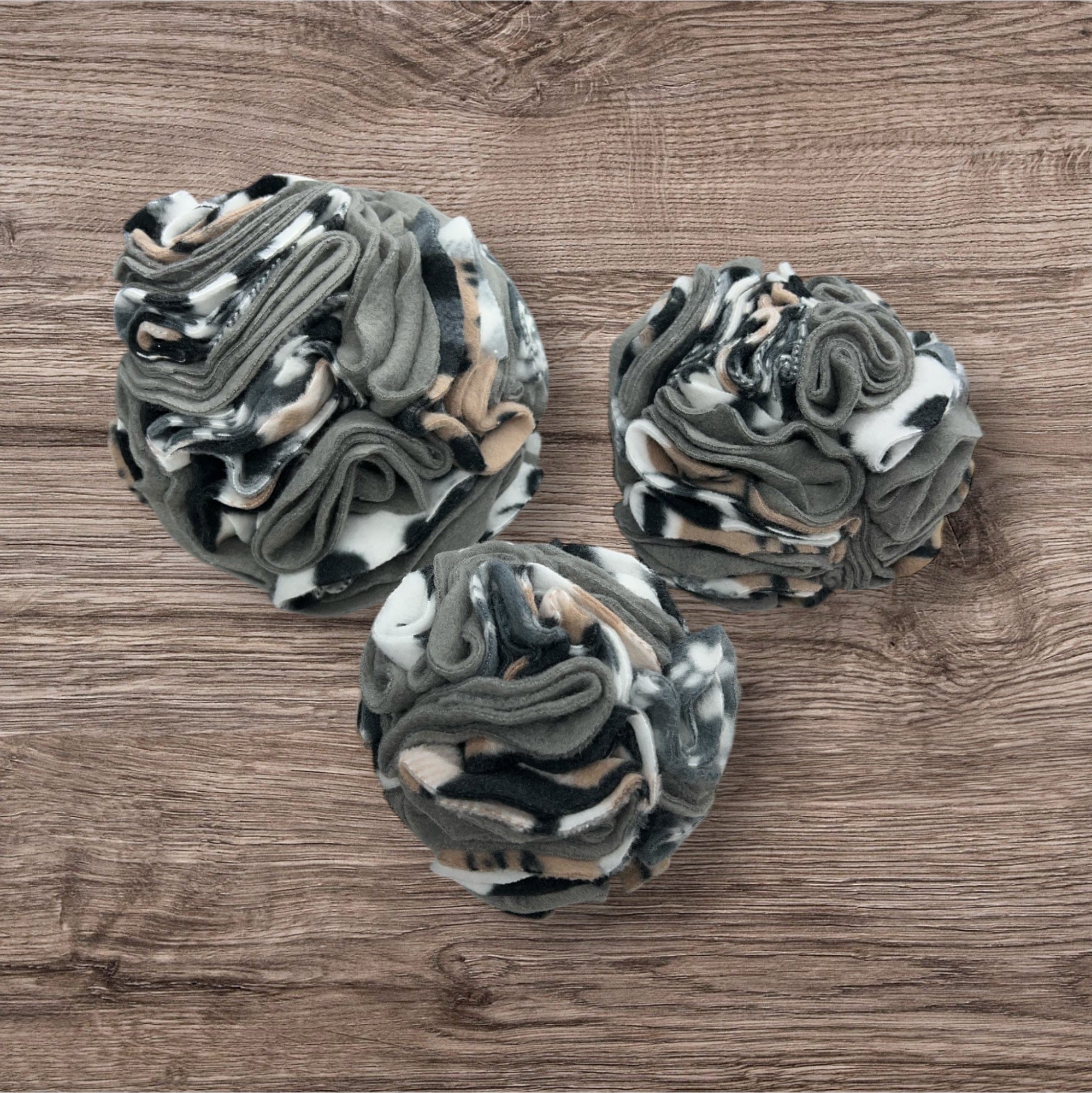 Buffalo Freeze Dry snuffle ball for dogs, featuring colorful fabric and textured design for interactive play and enrichment.